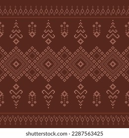Beautiful fabric patterns Native ethnic patterns can be used to knit shawls, curtains, blankets, sarongs, and yarn for all types of clothing including wall coverings. brown background.

