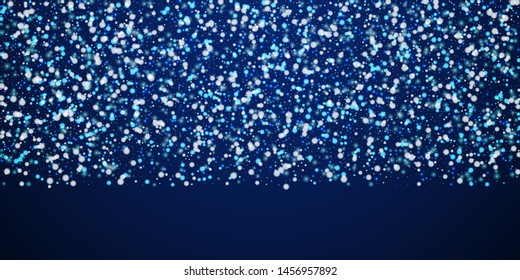 Beautiful falling snow Christmas background. Subtle flying snow flakes and stars on winter sky background. Adorable winter silver snowflake overlay template. Appealing vector illustration.