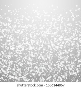 Beautiful falling snow Christmas background. Subtle flying snow flakes and stars on light grey background. Alluring winter silver snowflake overlay template. Juicy vector illustration.