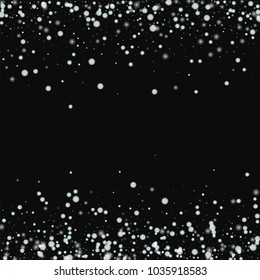 Beautiful falling snow. Scattered border on black background. Fascinating vector illustration.