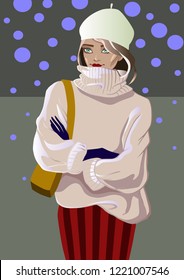 Beautiful fashion girl in a sweater and beret