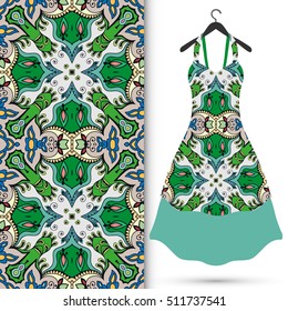 Beautiful fashion illustration. Women's dress on a hanger and seamless hand drawn pattern for textile, paper print. Isolated colorful dress and vertical seamless background, vector fashion collection