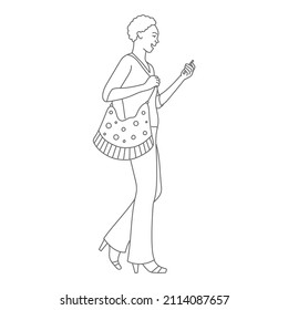 Beautiful fashion woman walking and using phone. Hand drawn vector illustration. Black and white.