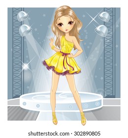 Beautiful fashionable blonde in gold evening dress dancing in the club
