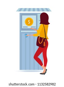 Beautiful fashionable girl, stands near the ATM money terminal, holding a payment bank card in her hand, for cashing funds from her finance account. Illustration in cartoon style.