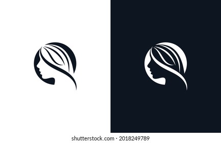 Beautiful female face and beauty of the logo
