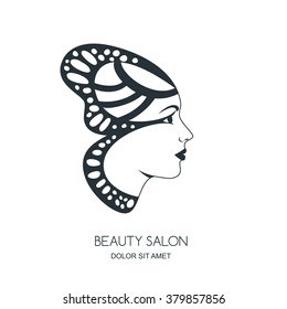 Beautiful female face in butterfly wings. Vector logo or label design. Black and white illustration of woman silhouette in profile. Concept for beauty salon, cosmetics, spa, fashion print.
