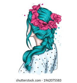 Beautiful female hairstyle and a wreath of flowers. Fashion and style, clothing and accessories.