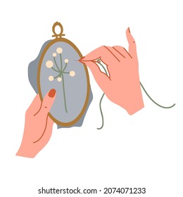 Beautiful female hands hold a hoop and embroider a botanical pattern.Flat vector graphics.