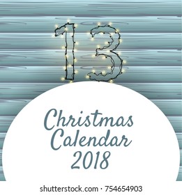Beautiful figures from garland with luminous lights decorate the New Year's Christmas advent calendar in December.