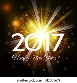 Beautiful fireworks with a bright flash of light and the greetings  Happy New Year 2017! 