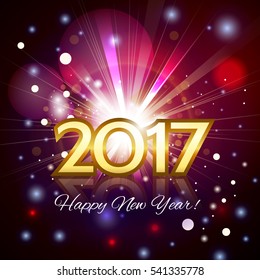 Beautiful fireworks with a bright flash of light with greetings Happy New Year! and gold number 2017