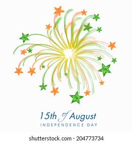 Beautiful fireworks in Indian trio colors with stars on grey background for 15th of August, Indian Independence Day celebrations. 