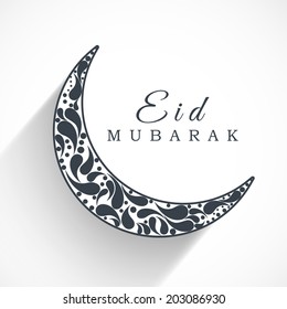 Beautiful floral decorated crescent moon in white and black colour for the occasion of Muslim community festival Eid Mubarak. 