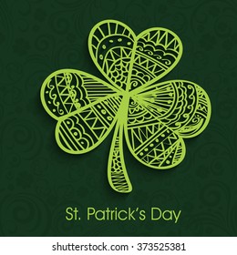 Beautiful floral design decorated creative Shamrock Leaf on green background for Happy St. Patrick's Day celebration.