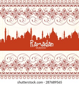Beautiful floral design and mosque decorated greeting card for Islamic holy month of prayers, Ramadan Kareem celebration.