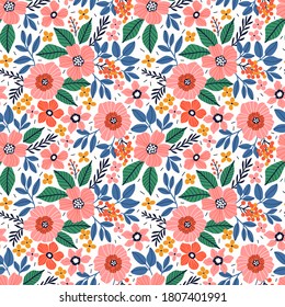 Beautiful floral pattern in small abstract flowers. Small coral flowers. White background. Ditsy print. Floral seamless background. The elegant the template for fashion prints.