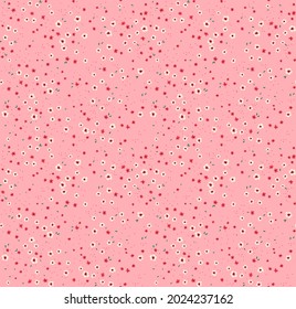 Beautiful floral pattern in small abstract flowers. Small white and red flowers. Pink background. Ditsy print. Floral seamless background. The elegant the template for fashion prints. Stock pattern. 