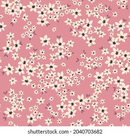 Beautiful floral pattern in small abstract flowers. Small white flowers. Pink background. Ditsy print. Floral seamless background. The elegant the template for fashion prints. Stock pattern.
