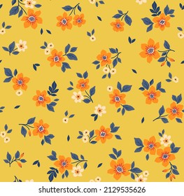 Beautiful floral pattern in small abstract flowers. Small orange flowers. Yellow background. Ditsy print. Floral seamless background. The elegant the template for fashion prints. Stock pattern.