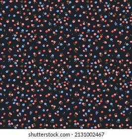 Beautiful floral pattern in small abstract flowers. Small blue, orange and pink flowers. Black background. Ditsy print. Floral seamless background. The elegant the template for fashion prints.