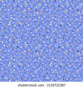 Beautiful floral pattern in small abstract flowers. Small colorful flowers. Pastel Blue background. Ditsy print. Floral seamless background. The elegant the template for fashion prints. Stock pattern.