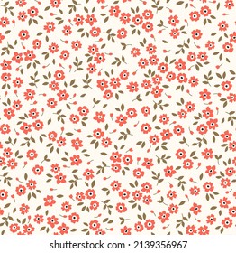 Beautiful floral pattern in small abstract flowers. Small red flowers. White background. Ditsy print. Floral seamless background. The elegant the template for fashion prints. Stock pattern.