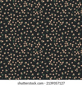 Beautiful floral pattern in small abstract flowers. Small pink flowers. Black background. Ditsy print. Floral seamless background. The elegant the template for fashion prints. Stock pattern.