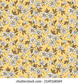 Beautiful floral pattern in small abstract flowers. Small white flowers. Light yellow background. Ditsy print. Floral seamless background. The elegant the template for fashion prints. Stock pattern.