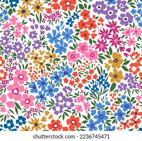 Beautiful floral pattern in small abstract flowers. Small colorful flowers. White background. Ditsy print. Floral seamless background. The gentle template for fashion prints. Stock pattern.