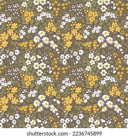 Beautiful floral pattern in small abstract flowers. Small white and yellow flowers. Light brown khaki background. Ditsy print. Floral seamless background. The elegant the template for fashion prints. 