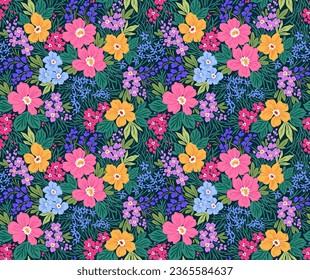 Beautiful floral pattern in small abstract flowers. Small colorful flowers. Dark blue background. Ditsy print. Floral seamless background. Liberty template for fashion prints. Stock pattern.