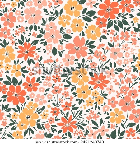 Beautiful floral pattern in small abstract flowers. Small yellow and orange flowers. White background. Ditsy print. Floral seamless background. Seamless decorative elegant pattern with cute flower.