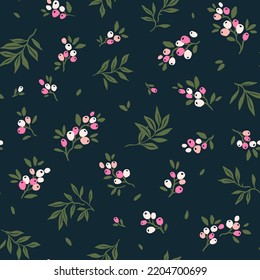 Beautiful floral pattern in small berries. Small pink flowers. Dark blue background. Ditsy print. Floral seamless background. The elegant the template for fashion prints. Stock pattern.