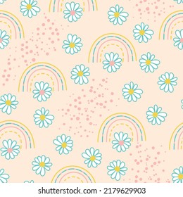 Beautiful floral pattern in small daisies and rainbows. Ditsy print. Floral seamless background. Vintage template for fashion prints.