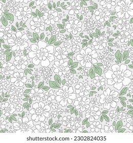 Beautiful floral pattern in small flowers. Delicate white flowers. Light gray background. Liberty print. Floral seamless background. Trendy template for fashion prints. Stock pattern.