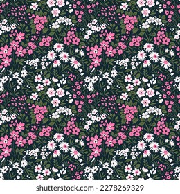 Beautiful floral pattern in small retro flowers. Small pink and white flowers. Dark blue background. Ditsy print. Floral seamless background. Stock vector for printing on surfaces. Abstract flowers.