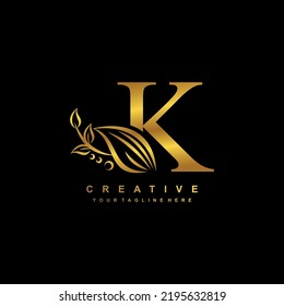 beautiful flourish gold letter K logo design. initial letter K. monogram, typography K. K luxurious logo with floral ornament. useful for company logo, business, boutique, wedding, brand, etc