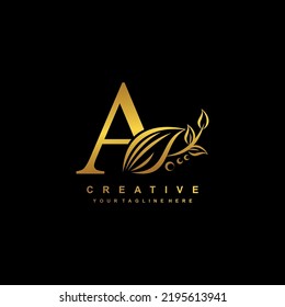beautiful flourish gold letter A logo design. initial letter A. monogram, typography A. A luxurious logo with floral ornament. useful for company logo, business, boutique, wedding, brand, etc