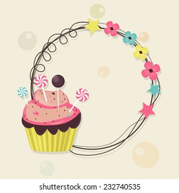 Beautiful flower decorated blank frame with delicious cup cake and candies on stylish background for Happy New Year celebrations.