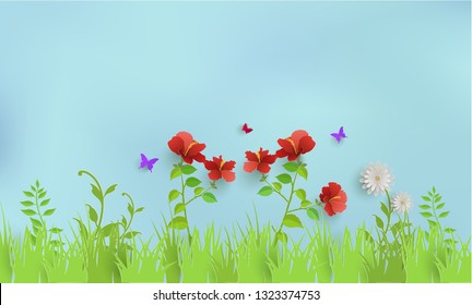beautiful flower and grass in spring. there are butterflies and beautiful sky