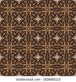 Beautiful flower pattern on Jogja batik with elegant blend brown and golden color design.
