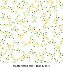 Beautiful flower pattern. Small yellow flowers. White background. Flower colors in a flowery background. Elegant template for fashionable prints.