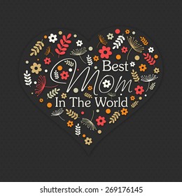 Beautiful flowers decorated heart with text Best Mom in the World on black background for Happy Mother's Day celebration. 