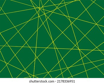 Beautiful geometric background with yellow lines drawn on green paper. Geometric style pattern.