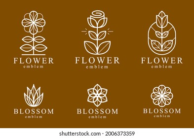 Beautiful geometric flower logos vector linear designs set, sacred geometry line drawing emblems or symbols collection, blossoming flower hotel or boutique or jewelry logotypes.