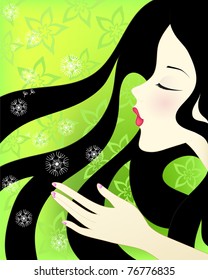 beautiful girl blowing on dandelions