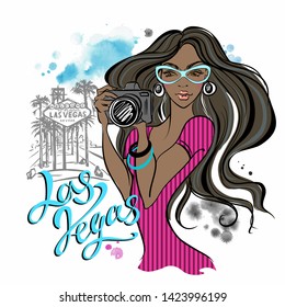 A beautiful girl with a camera travels to Las Vegas. Vector.