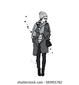 Beautiful girl in a coat with a cap and a scarf. Stylishly dressed woman. Vector fashion illustration.
