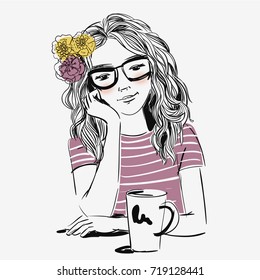 Beautiful girl with coffee cup and flowers